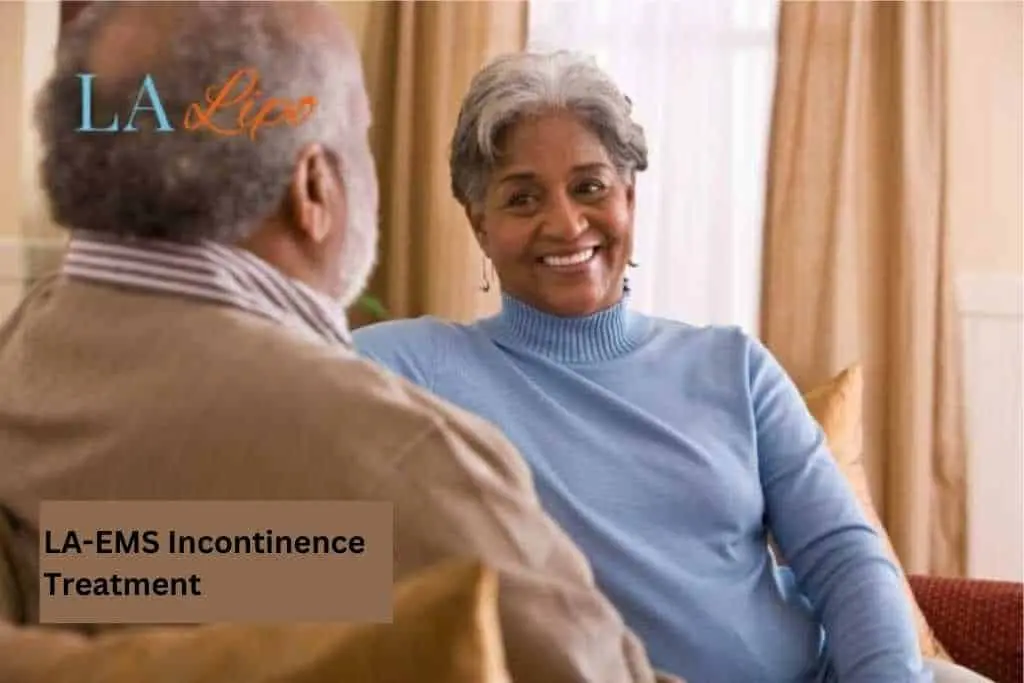 Couple sat smiling at each other - LA-EMS treatment Norwood Green